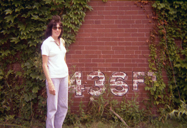 Regina Brendel stands at the outfield wall
near the Cathedral of Learning - 1975.
