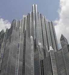 The PPG buildings rise
 skyward, all symetrically in line