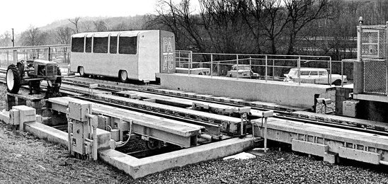 The old farm tractor used to retrieve
disabled cars sits at the North Station.
The converted phone booth to the right
controlled the vehicle transfer table.