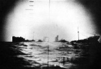 Sinking ship in the crosshairs of a German periscope.