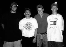 George Nassif, Rich Munizza, Tim Reitmeyer
and Kevin Reitmeyer coached the Poremski
Plumbing team to 31 victories in a row
in route to back-to-back titles in 1998-99.
The coaches are all smiles after their
1999 championship victory.