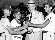 Jack Flavin, Jack Wertz and Fred Luvara
accept District 4 championship trophy
from Pittsburgh Mayor David L. Lawrence
on July 29, 1958. Their team finished
the Williamsport tournament as Pennsylvania
state runners-up. No other Brookline
All-Star team has advanced further in
the official Little League World Series.