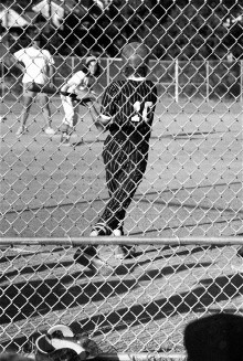 Doug Brendel swats a triple in
Denmark Cafe's first game on the
new McGibbeny field in 1977