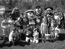 Hamburgler, Grimace, Wild Thing, Rita and the
players on Opening Day, 2011.