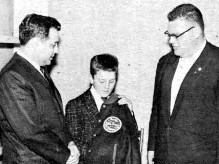 Jack Wertz receives his All-Star
championship jacket from Tom Foerster.