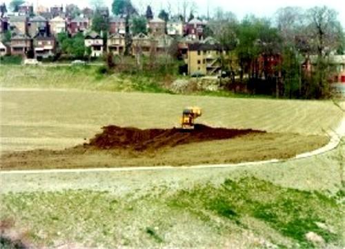 Top soil being spread the new ballfield.