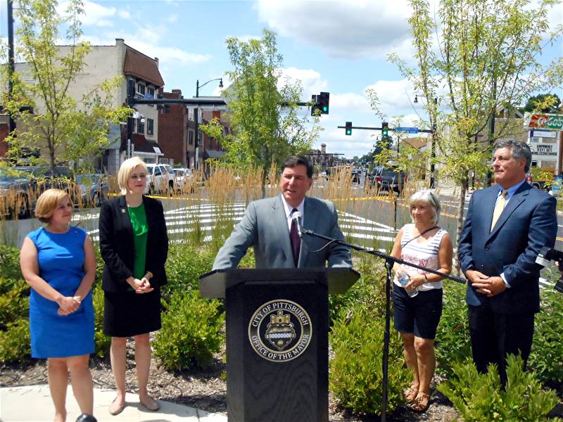 Mayor William Peduto addresses a crowd gathered at the
dedication of Brookline Boulevard on July 24, 2014.