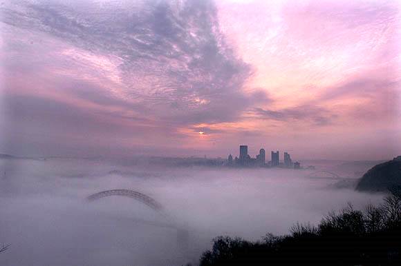 The City of Pittsburgh shrouded
 in fog on a March 2007 morning.