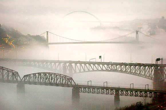 The City of Pittsburgh shrouded
 in fog on a March 2007 morning.